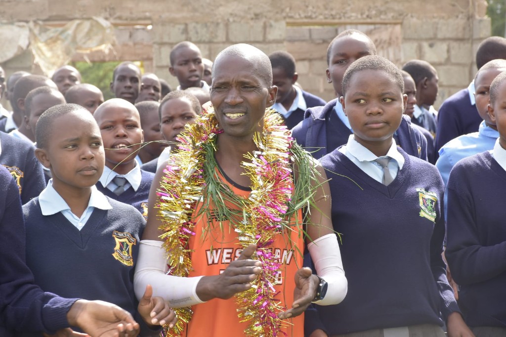 Kosgei with students in Iten
